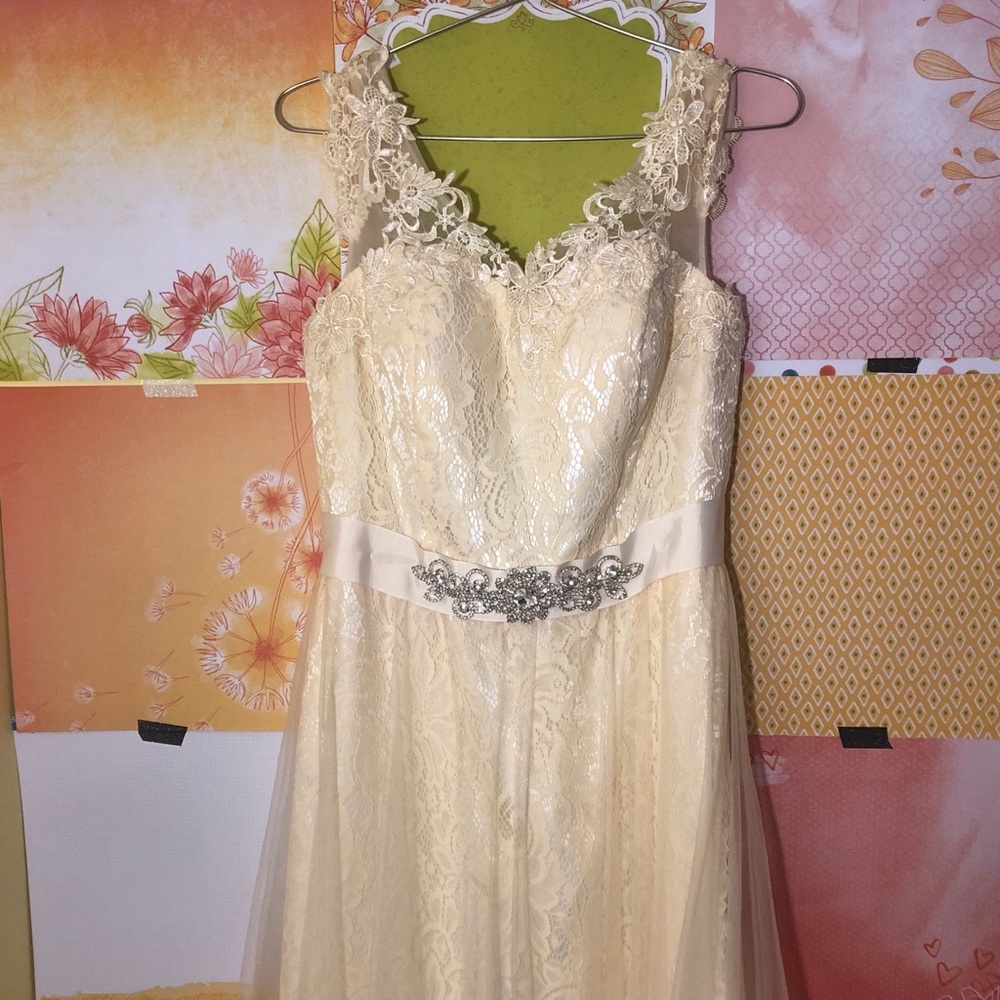Full length crème evening gown